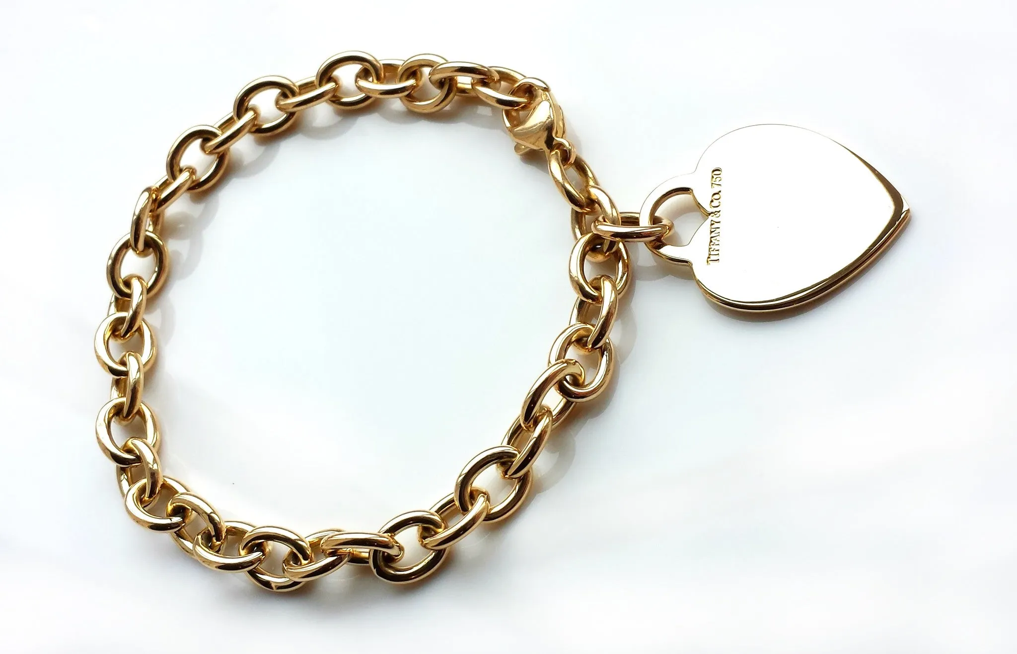 Tiffany & Co. 18k Gold Heart Tag Charm Bracelet, 7½ inches