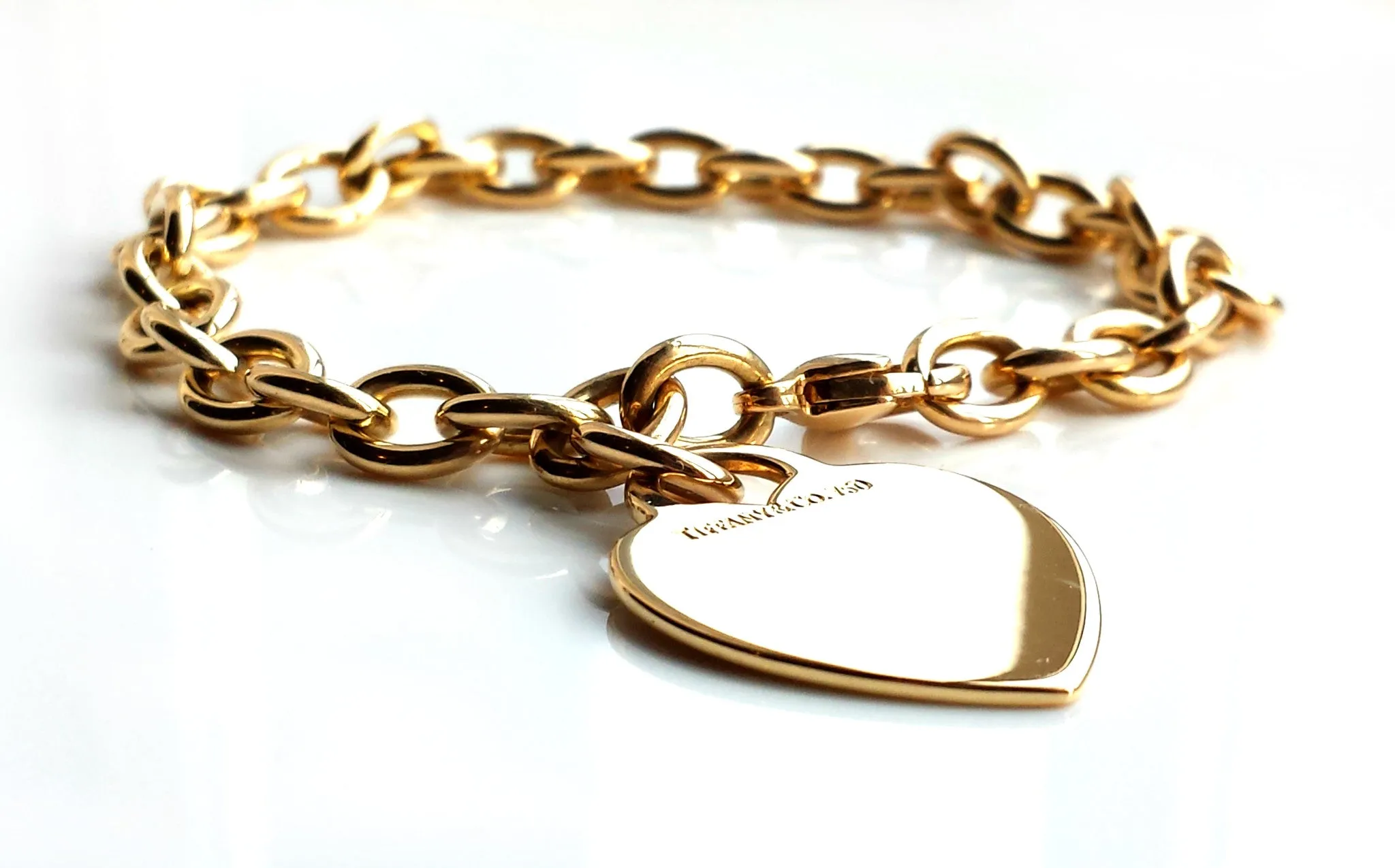 Tiffany & Co. 18k Gold Heart Tag Charm Bracelet, 7½ inches