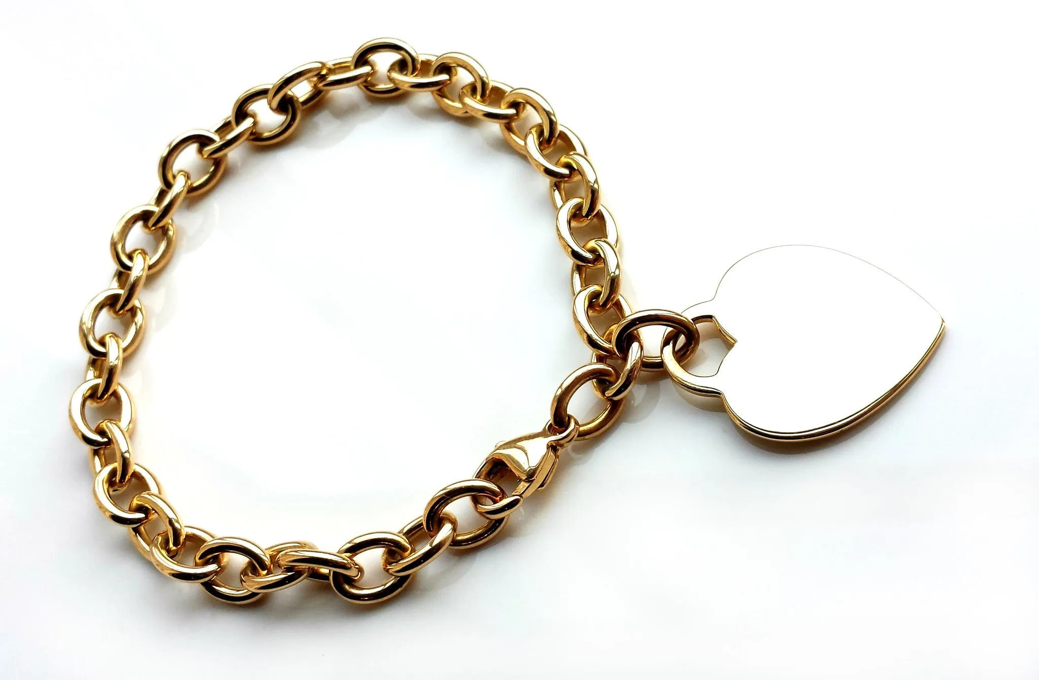 Tiffany & Co. 18k Gold Heart Tag Charm Bracelet, 7½ inches
