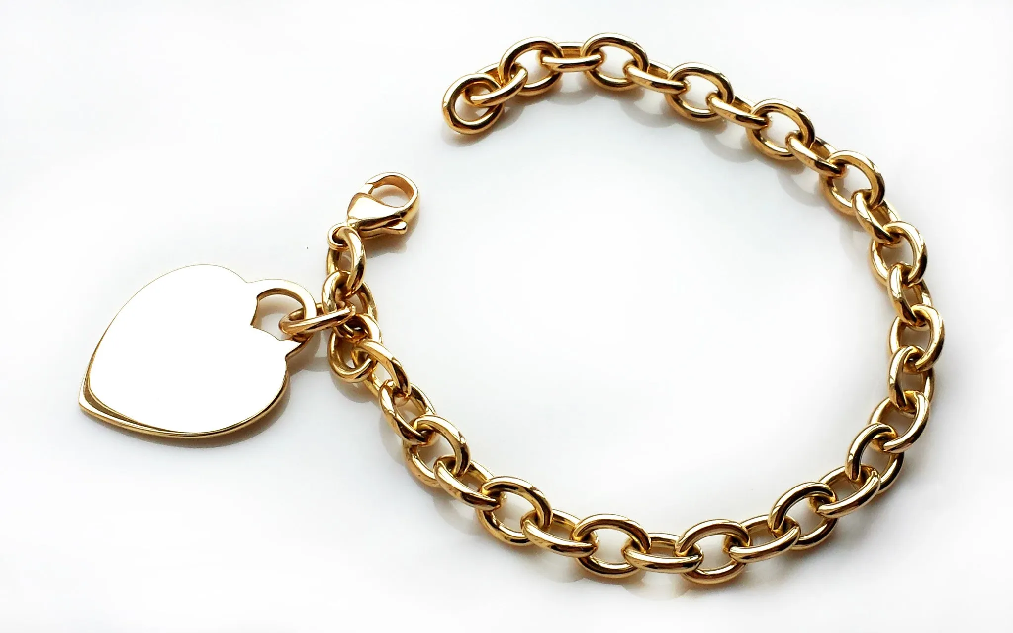 Tiffany & Co. 18k Gold Heart Tag Charm Bracelet, 7½ inches